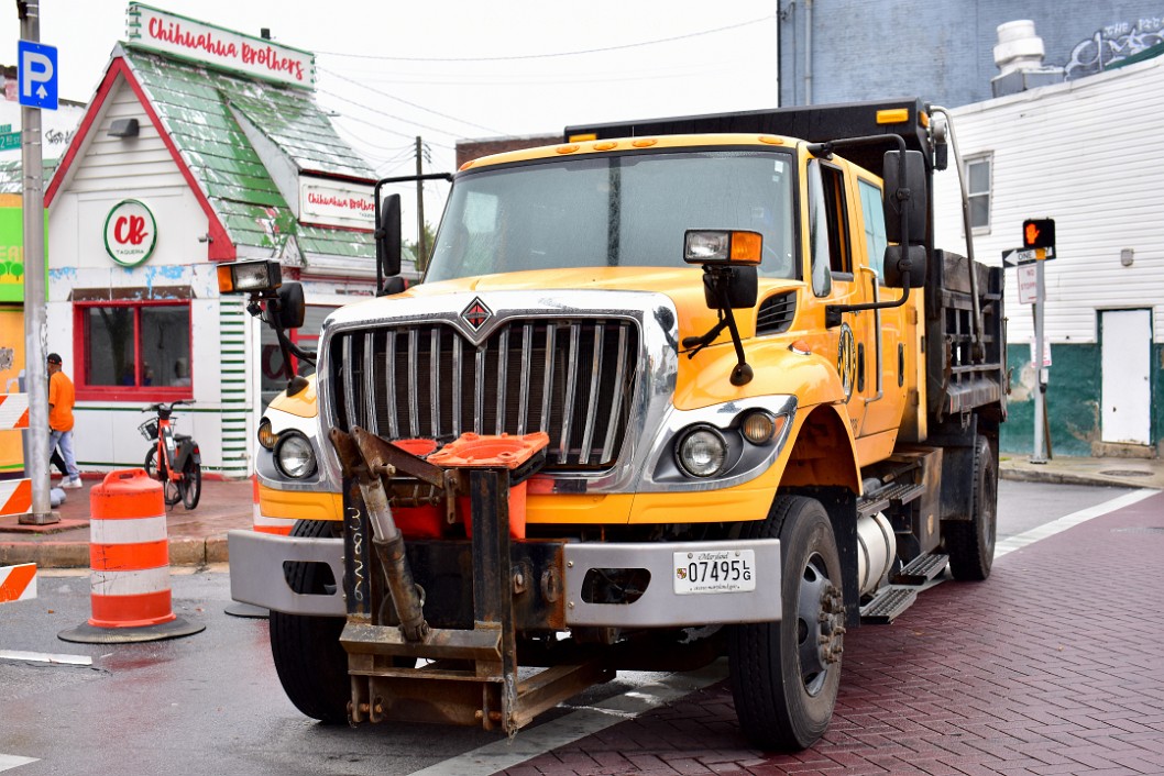 Public Works Truck Helping to Seal Off the Street