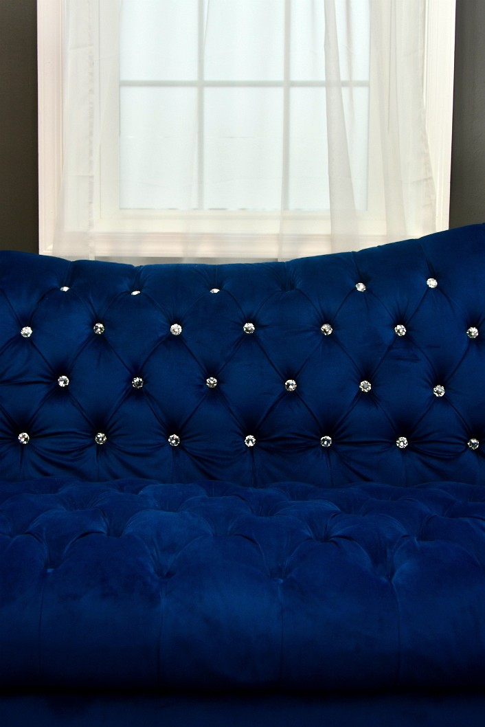Window and Blue Couch