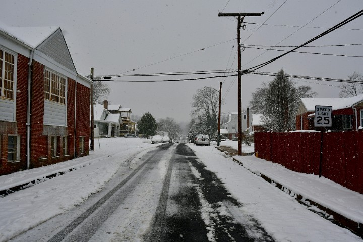 Facing West as the Snow Falls