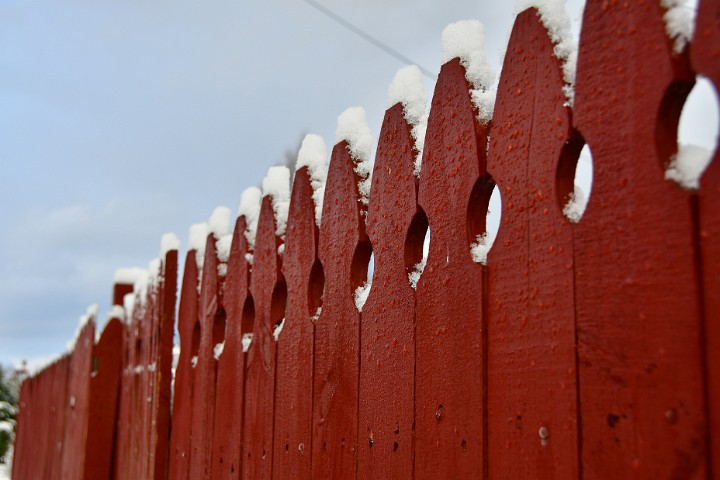 Snow Topped Red Fence