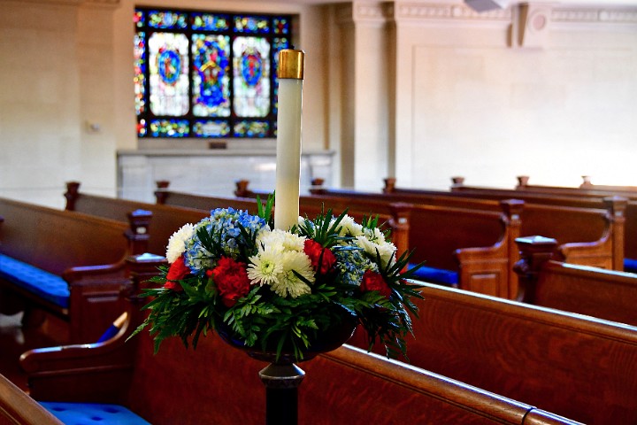 Candle Marking the Pew For Missing Sailors