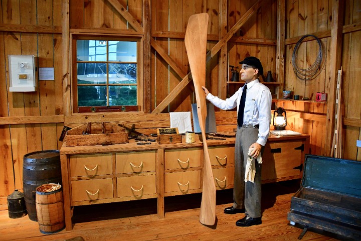 Proudly Holding a Hand-Made Wooden Propeller