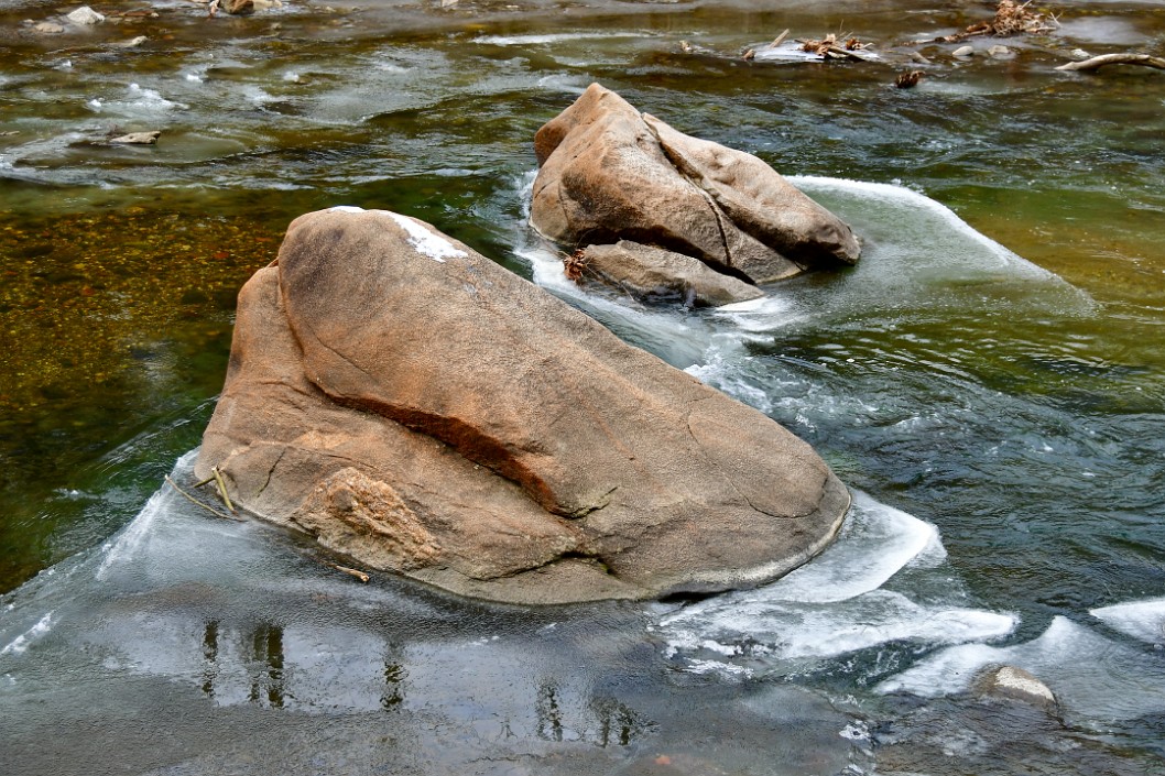 Two Rocks in Icy Water